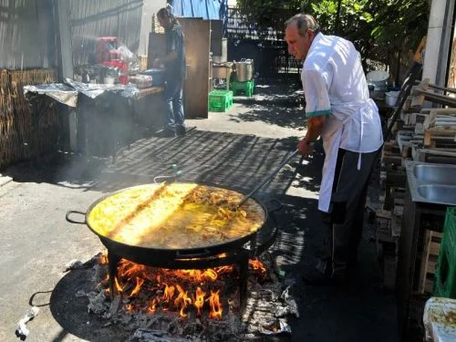 Man cooking paella